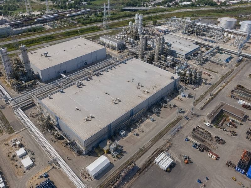 drone-lidar-industrial-roof-yard-documentation | Cleveland Land Surveying Aerial drone view of expansive industrial roofs, equipment areas and paved facility yards being documented for LiDAR mapping.